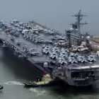 Kapal induk AS bertenaga nuklir, Theodore Roosevelt, tiba di kota pelabuhan Busan, Korea Selatan, pada awal bulan ini yang ikut serta dalam latihan militer bersama dengan negara tuan rumah Korea Selatan dan Jepang