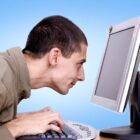 A Person Behind the Computer 
