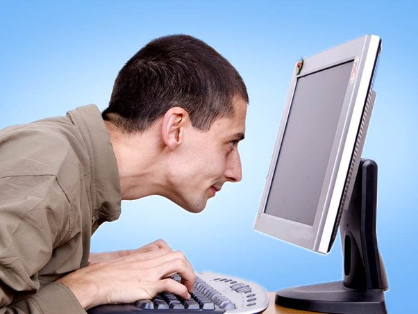 A Person Behind the Computer 