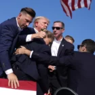 Republican presidential candidate former President Donald Trump is surrounded by U.S. Secret Service agents at a campaign rally, Saturday, July 13, 2024, in Butler, Pa. (AP Photo/Evan Vucci)
