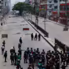 Members of Border Guard Bangladesh (BGB) and the police work to control the protesters outside the state-owned Bangladesh Television as violence erupts after anti-quota protests by students, in Dhaka, Bangladesh, July 19, 2024. REUTERS/Mohammad Ponir Hossain
