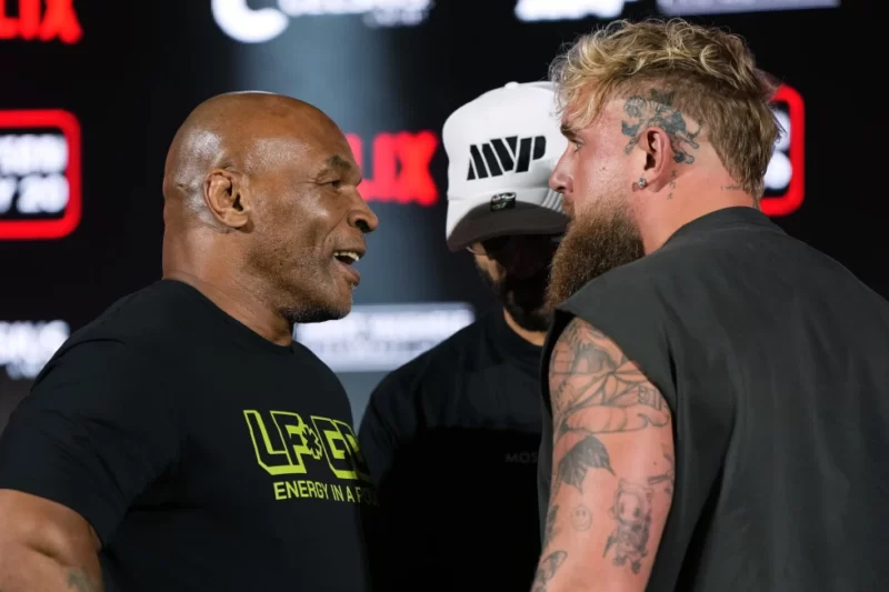  Mike Tyson, left, and Jake Paul, right, face off during a news conference promoting their upcoming boxing bout, May 16, 2024, in Arlington, Texas. (AP Photo/Sam Hodde, File)