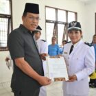 Bupati Humbang Hasundutan, Dosmar Banjarnahor, SE, secara resmi mengukuhkan perpanjangan masa jabatan 19 Kepala Desa (Kades) di Kecamatan Parlilitan pada Rabu, 25 September 2024